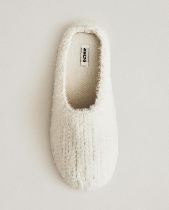 FAUX FUR SLIPPERS WITH PLAITED DETAIL