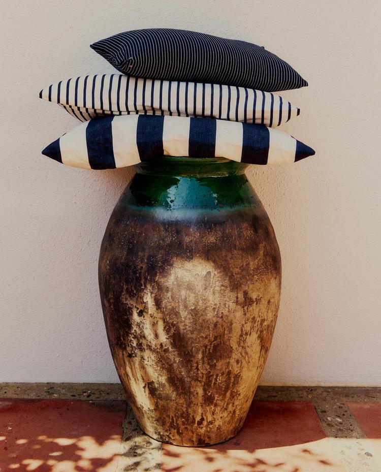 CUSHION COVERS AND VASE