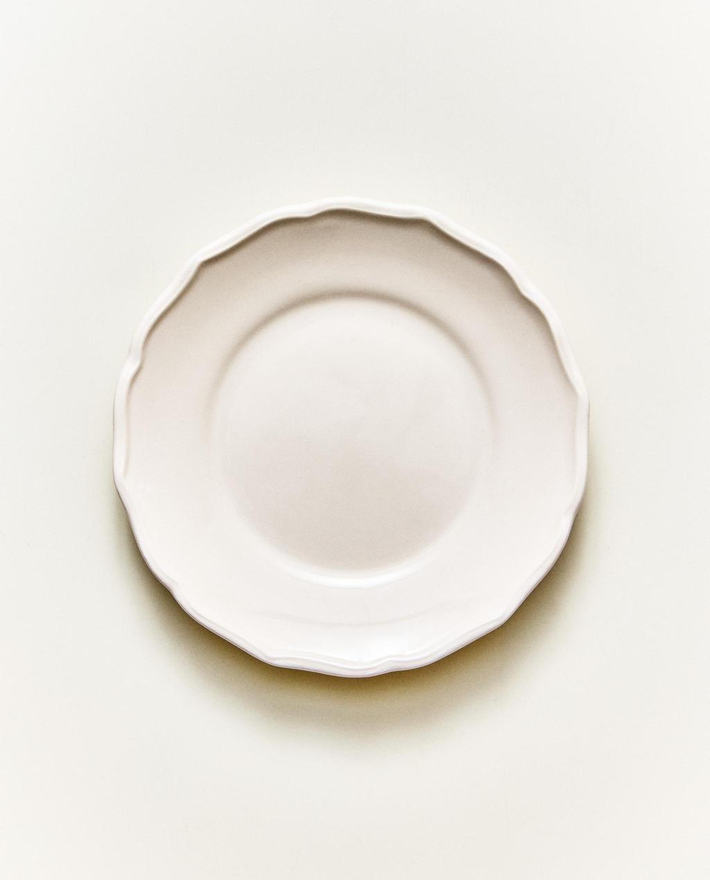 EARTHENWARE SIDE PLATE WITH RAISED-DESIGN EDGE