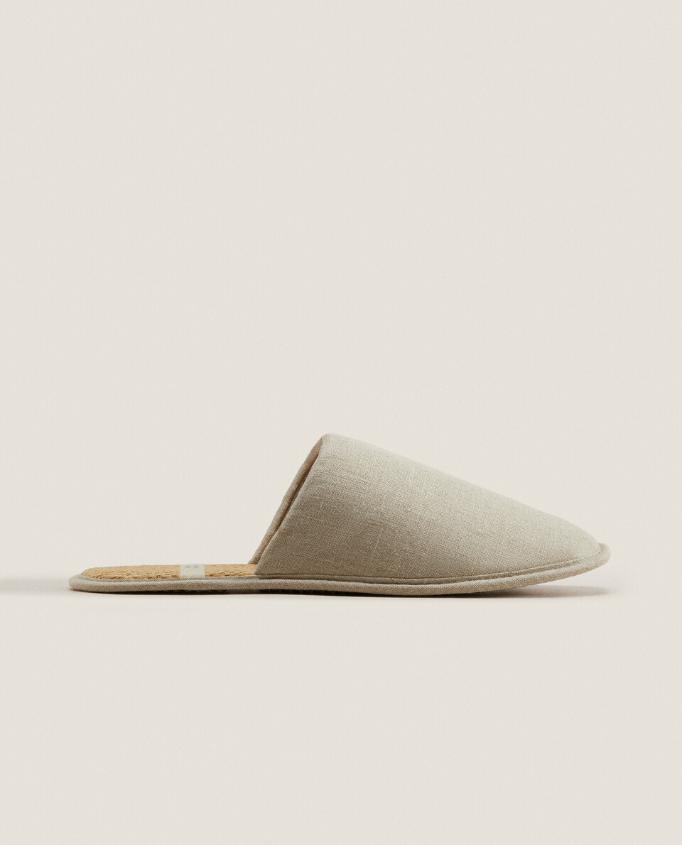 Linen slippers with sole detail