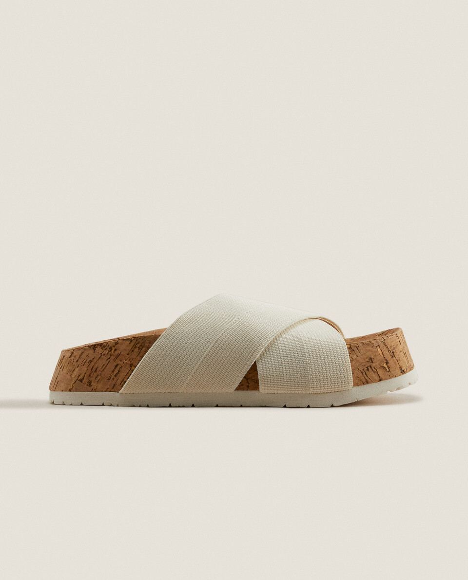 Flatform sandals with crossover straps