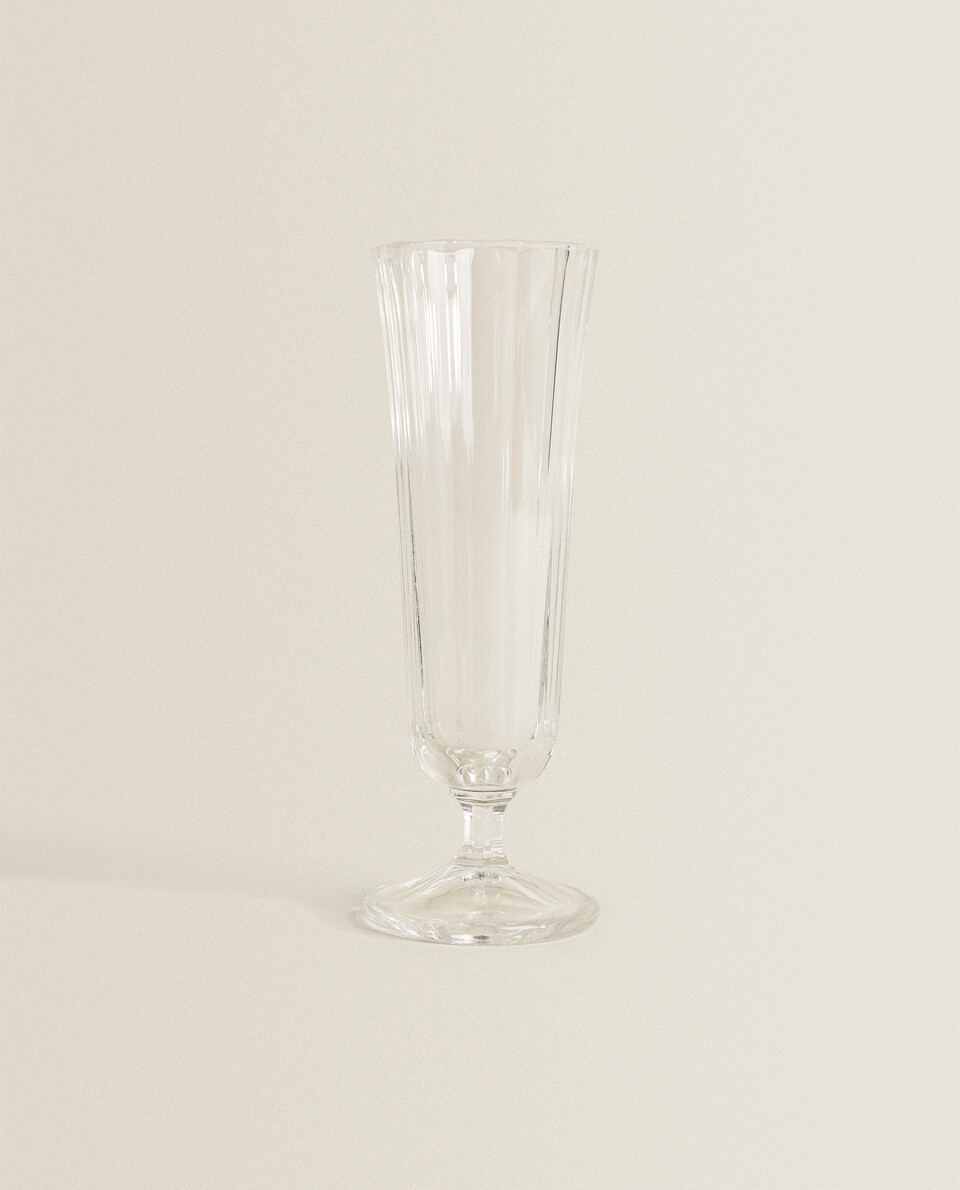 FLUTE GLASS WITH RAISED DESIGN