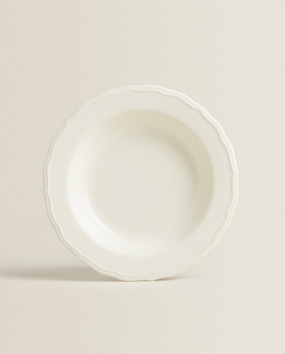 EARTHENWARE SOUP PLATE WITH A RAISED-DESIGN EDGE