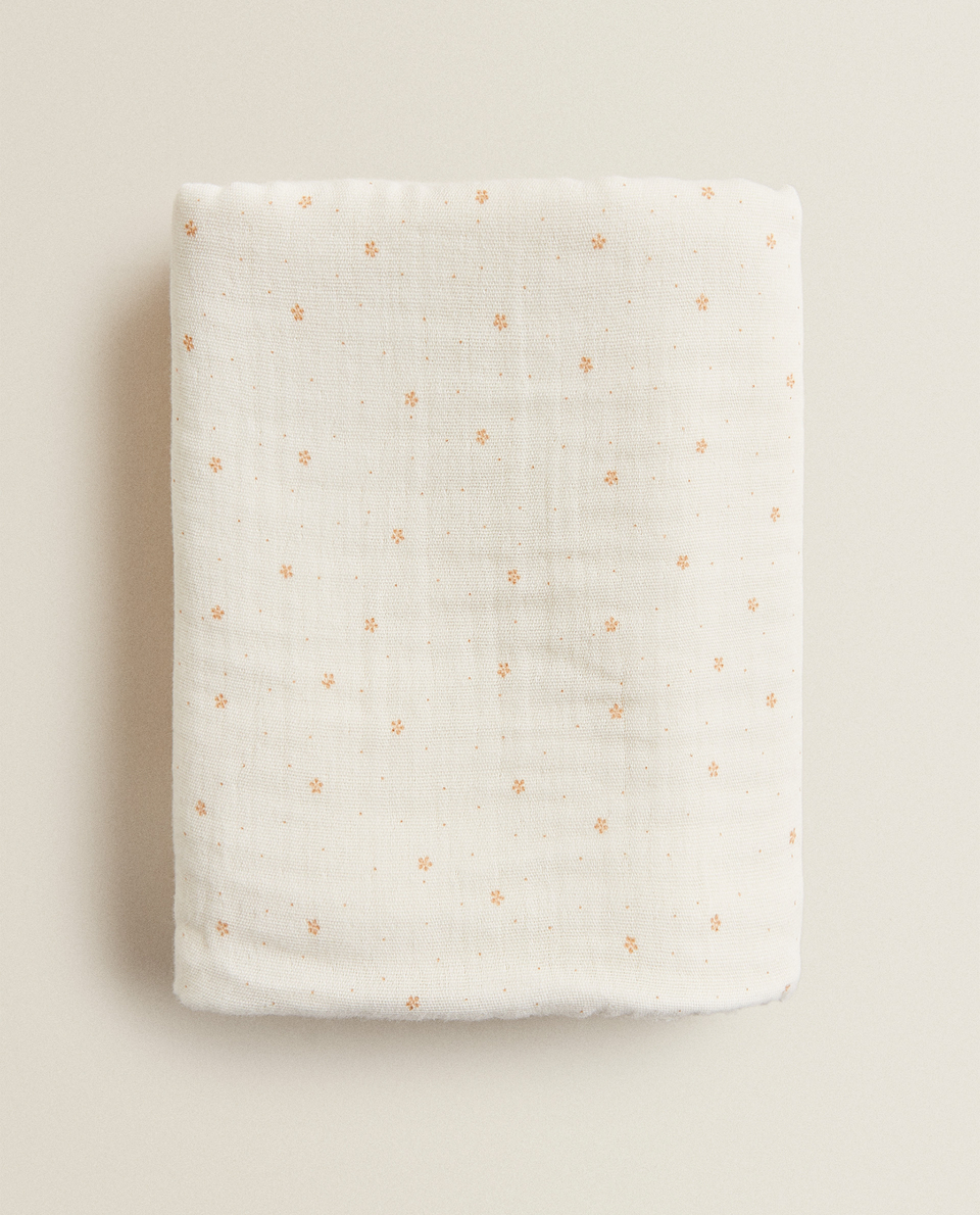 DOUBLE-SIDED TOWEL WITH MINI FLORAL PRINT
