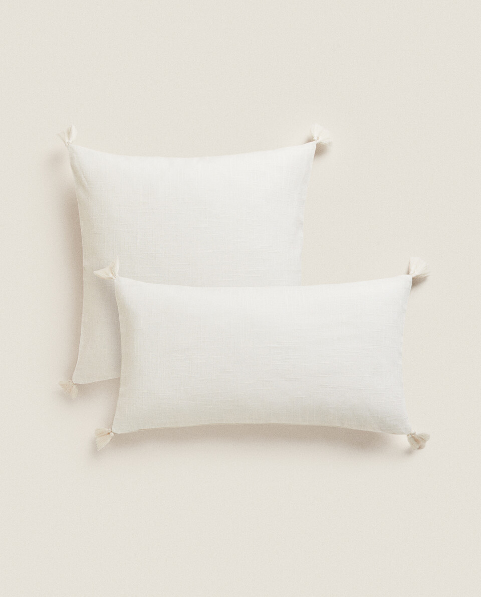 CUSHION COVER WITH TASSELS