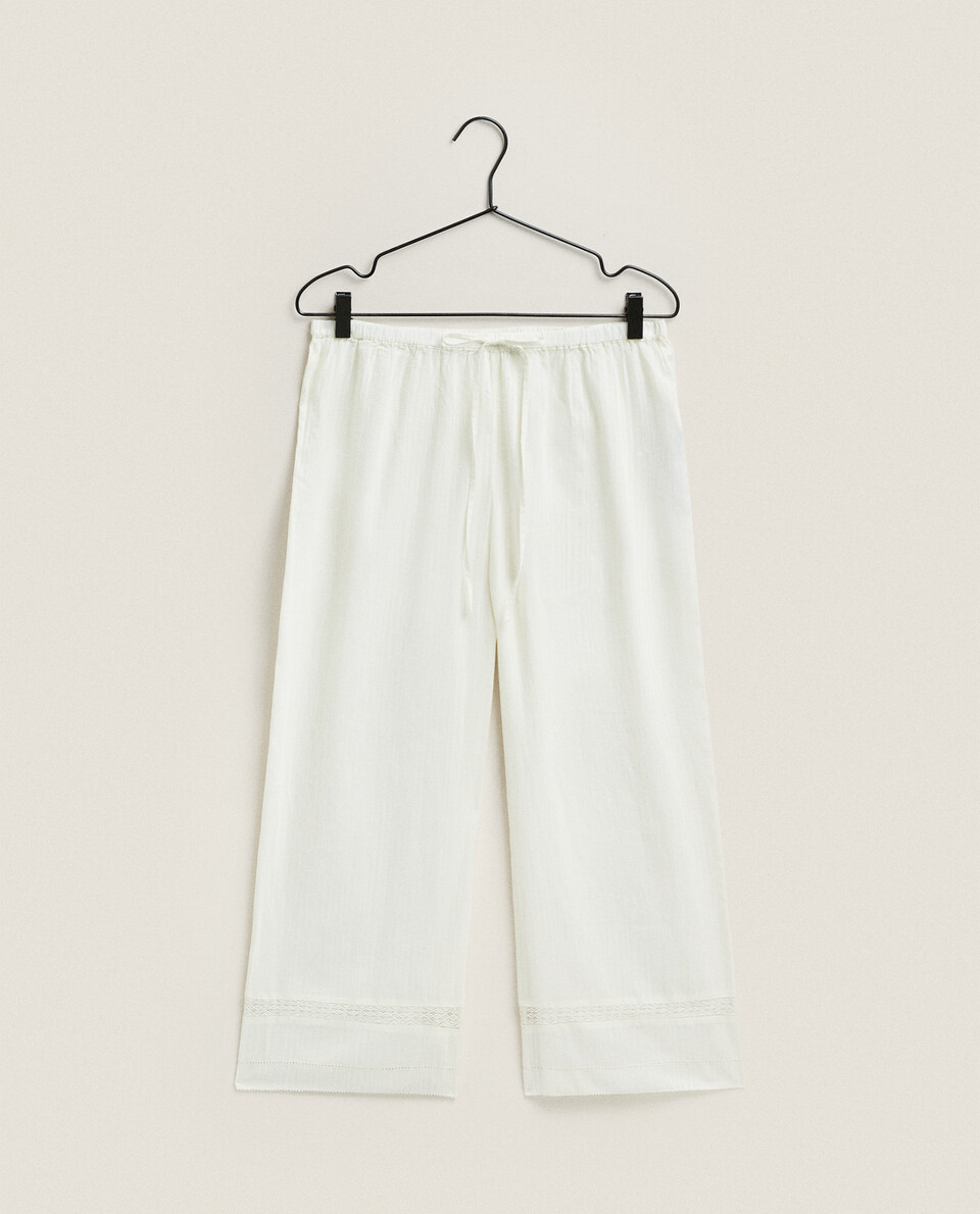 CROPPED TROUSERS WITH LACE TRIM