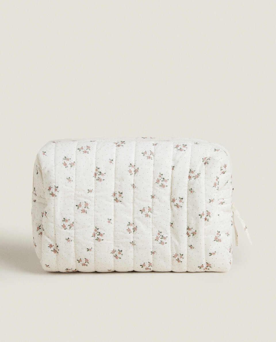 QUILTED TOILETRY BAG WITH FLORAL PRINT