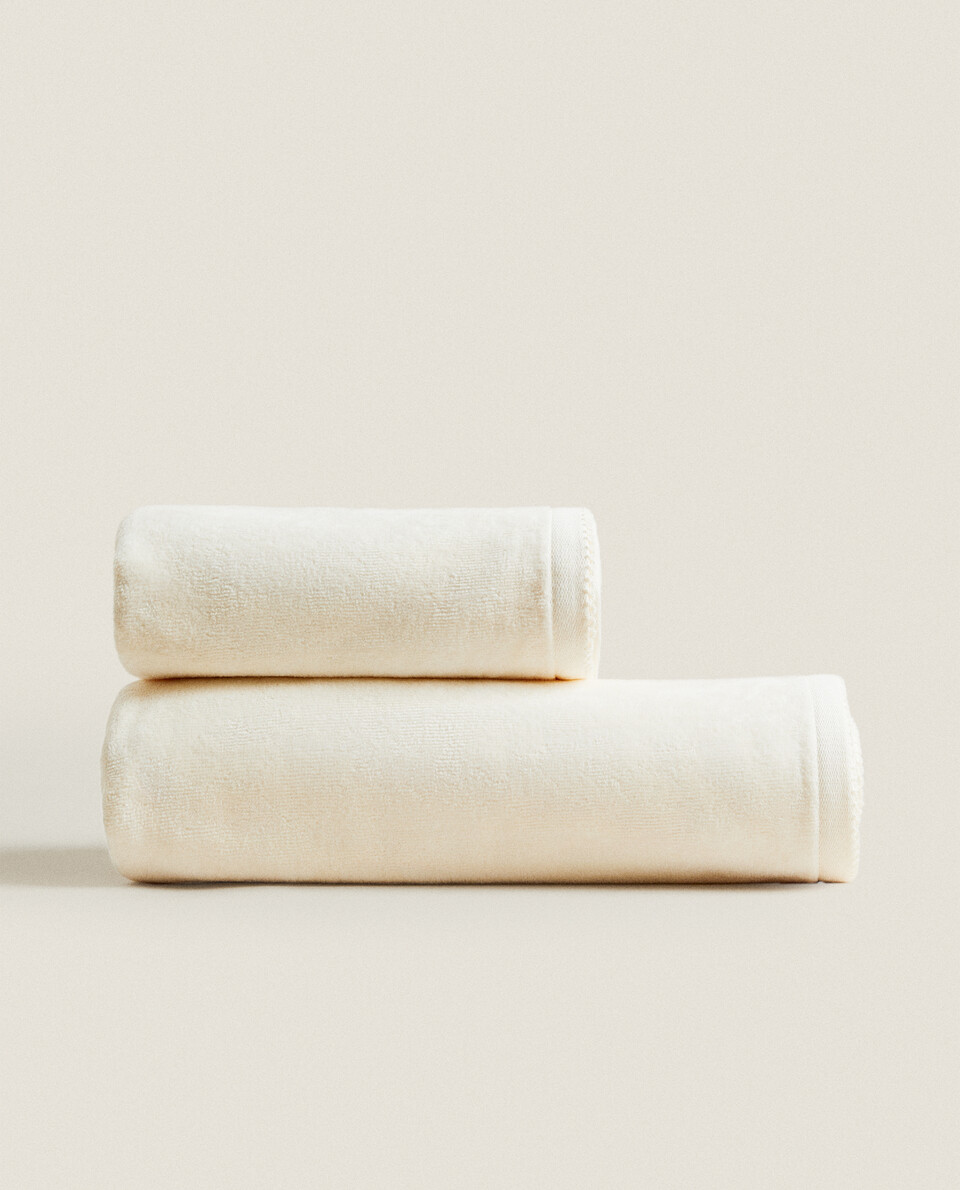VELOUR TOWEL WITH TRIM DETAIL