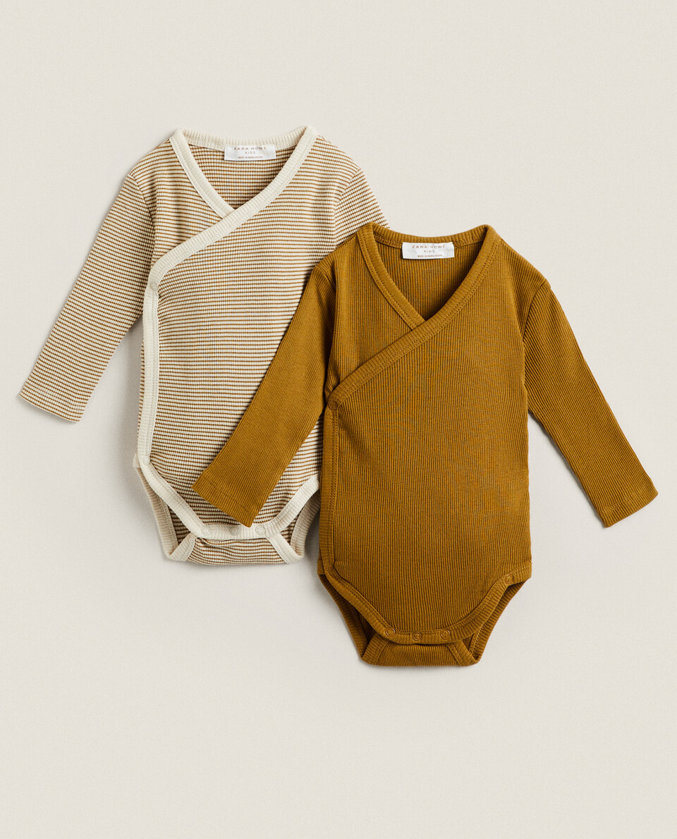 RIBBED CROSSOVER BODYSUITS