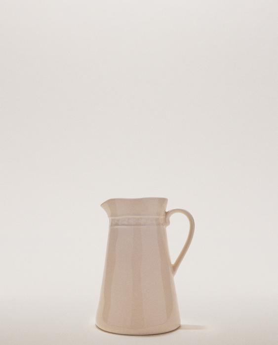 浮雕粗陶牛奶壶