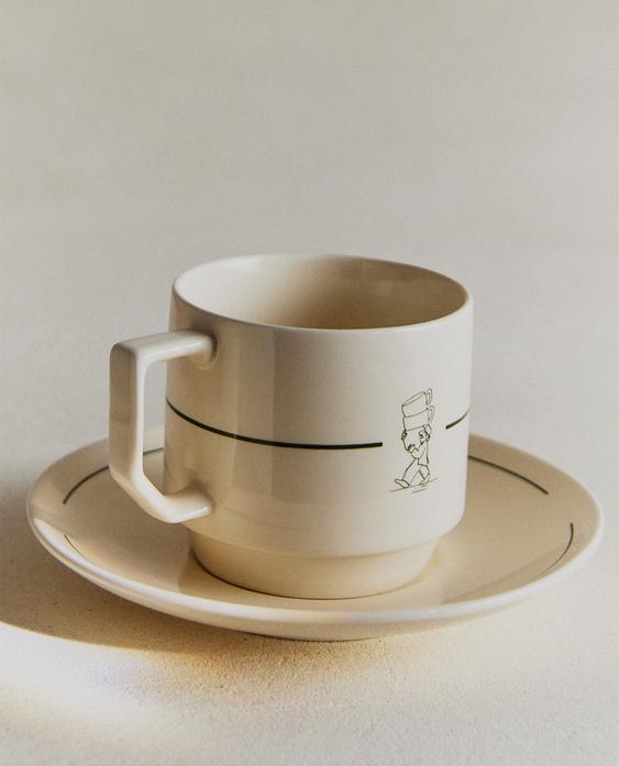 STONEWARE TEACUP AND SAUCER