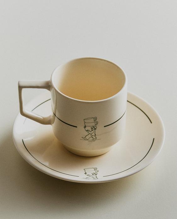 STONEWARE COFFEE CUP AND SAUCER