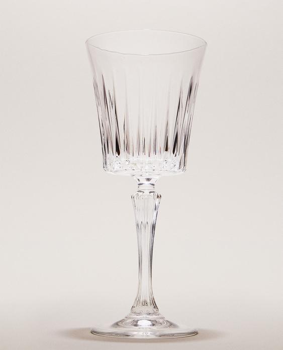 CRYSTALLINE WINE GLASS WITH RAISED DESIGN