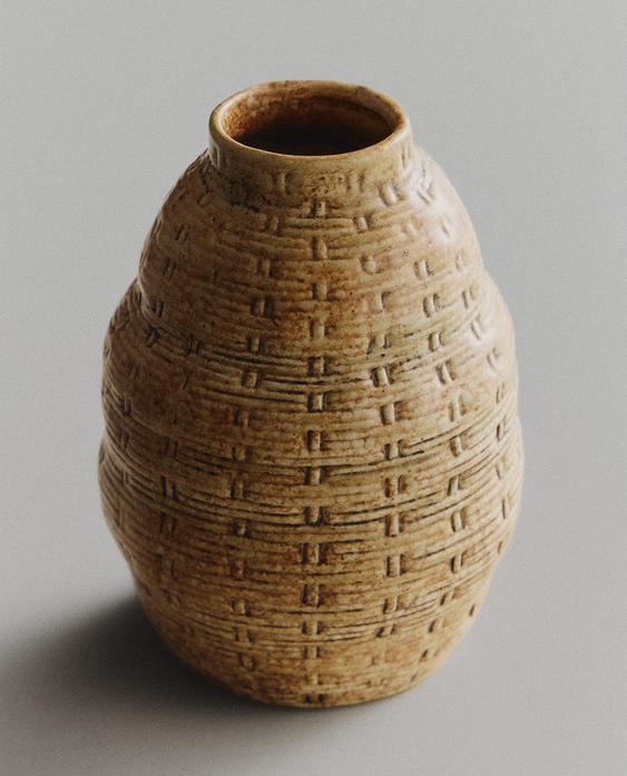 IRREGULAR CLAY VASE