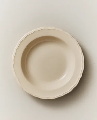 EARTHENWARE SOUP PLATE WITH RAISED-DESIGN EDGE