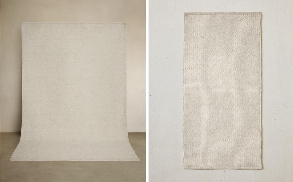 LIGHT-COLOURED WOOL RUG