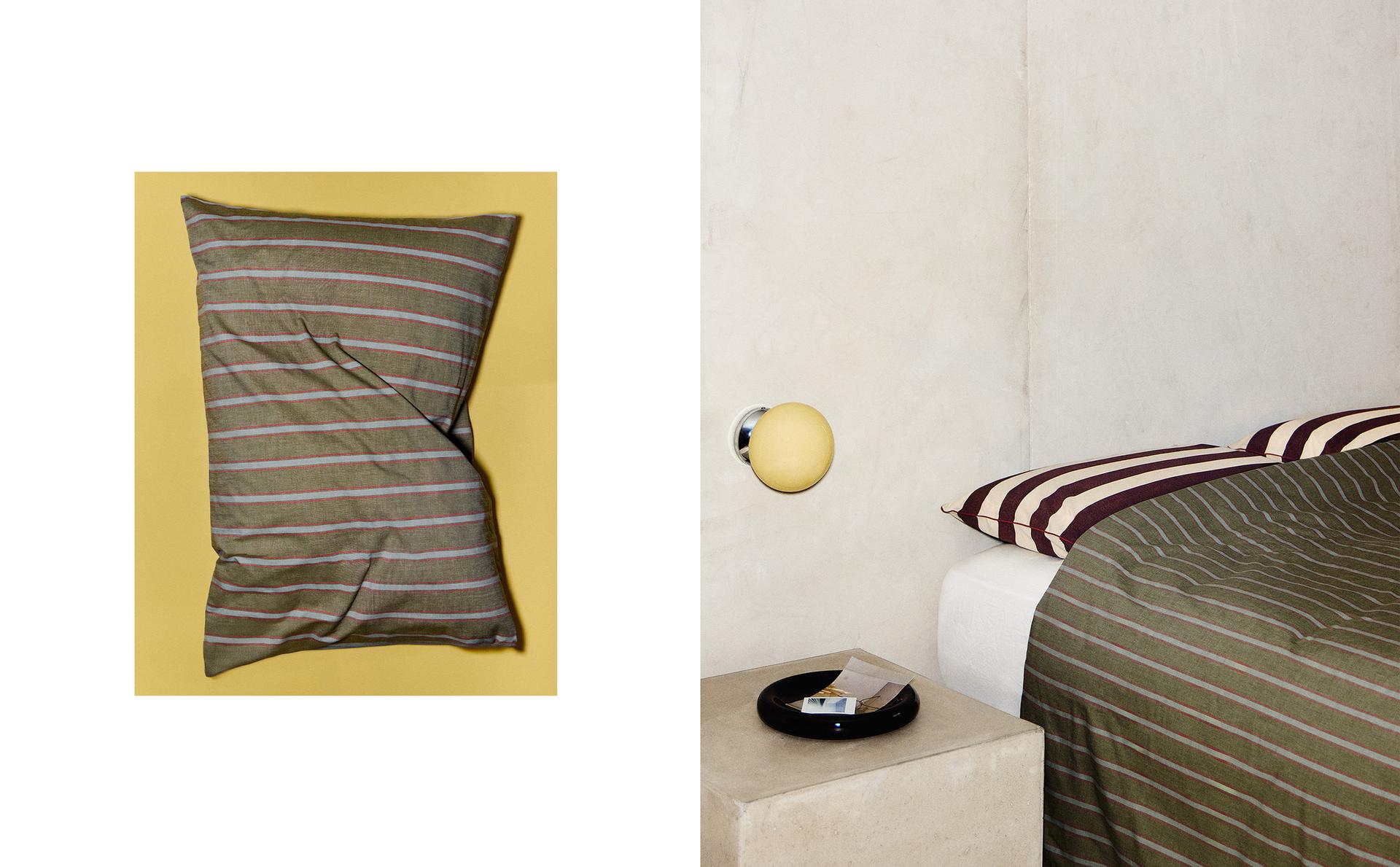 STRIPED BED LINEN, LIGHT FIXTURE AND TRAY