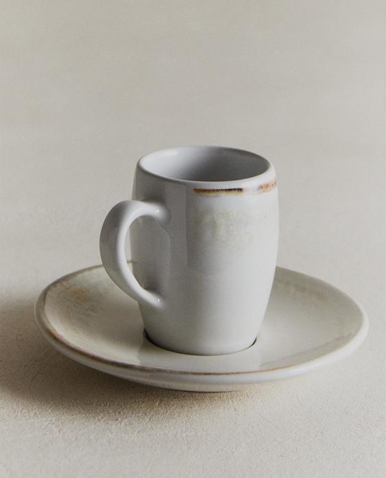 STONEWARE COFFEE CUP AND SAUCER
