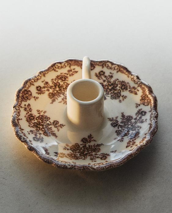 FLORAL EARTHENWARE CANDLESTICK
