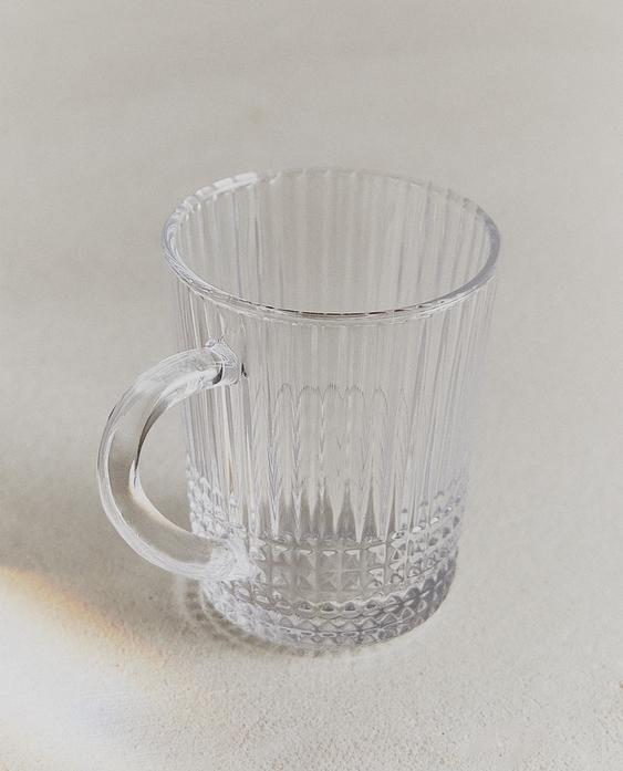 GLASS MUG WITH RAISED GEOMETRIC DESIGN GLASS MUG WITH RAISED GEOMETRIC DESIGN