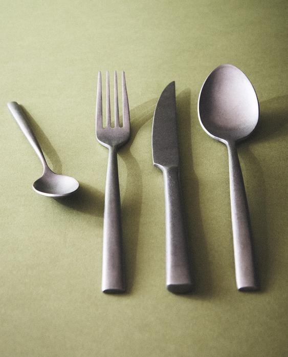 4-PIECE VINTAGE STEEL CUTLERY SET